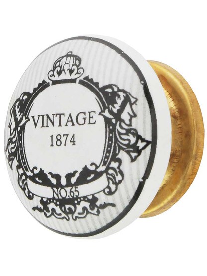 White Porcelain 1874 Vintage Label Cabinet Knob with Brass Base in Un-Lacquered Brass.